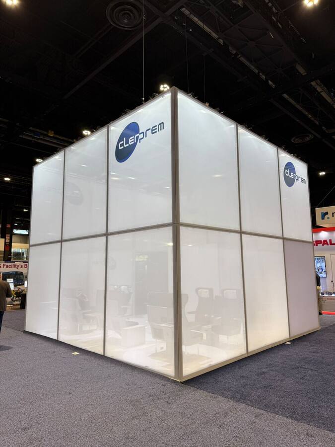 The Clerprem booth at APTA TRANSform 2026: an illuminated mesh cube with the Clerprem logo