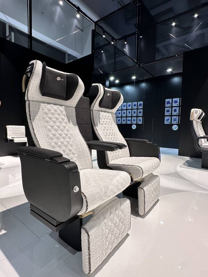 Clerprem railway seats in quilted bouclé inside the InnoTrans 2026 booth